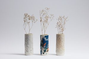 Three vases with twigs